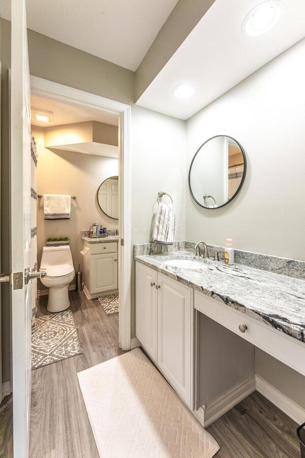 419 Wooten Ct S, Powell, OH 43065 - full bath with wood finished floors and vanity