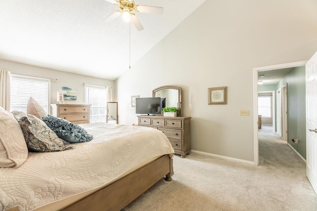 419 Wooten Ct S, Powell, OH 43065 - bedroom featuring light carpet, multiple windows, ceiling fan, and high vaulted ceiling