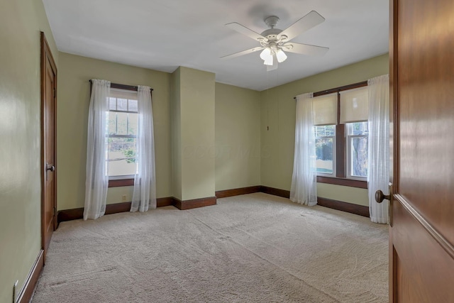 206 E Fair Ave, Lancaster, OH 43130 - carpeted spare room with baseboards and ceiling fan