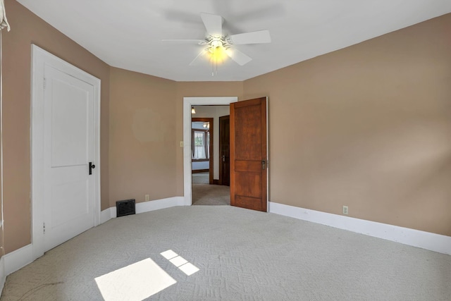 206 E Fair Ave, Lancaster, OH 43130 - unfurnished bedroom featuring light colored carpet and a ceiling fan