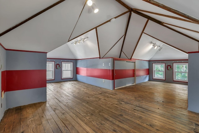 206 E Fair Ave, Lancaster, OH 43130 - unfurnished living room featuring hardwood / wood-style flooring and track lighting
