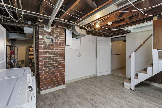 206 E Fair Ave, Lancaster, OH 43130 - unfinished basement with wood finished floors, stairway, and washer / clothes dryer