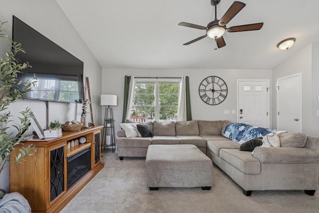2587 Weeping Willow Ct, Columbus, OH 43207 - living area featuring vaulted ceiling, a ceiling fan, and carpet