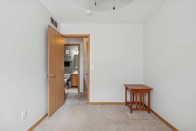 2587 Weeping Willow Ct, Columbus, OH 43207 - carpeted spare room with baseboards and a smoke detector