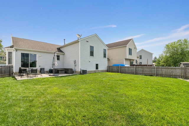 2587 Weeping Willow Ct, Columbus, OH 43207 - rear view of property with a patio area and a fenced backyard