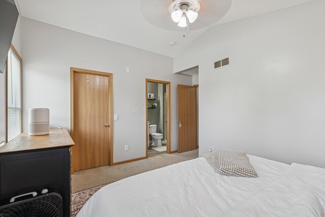 2587 Weeping Willow Ct, Columbus, OH 43207 - bedroom with light colored carpet, high vaulted ceiling, and ensuite bath