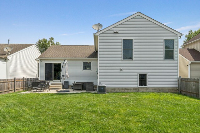 2587 Weeping Willow Ct, Columbus, OH 43207 - back of house with entry steps, a patio, and a fenced backyard