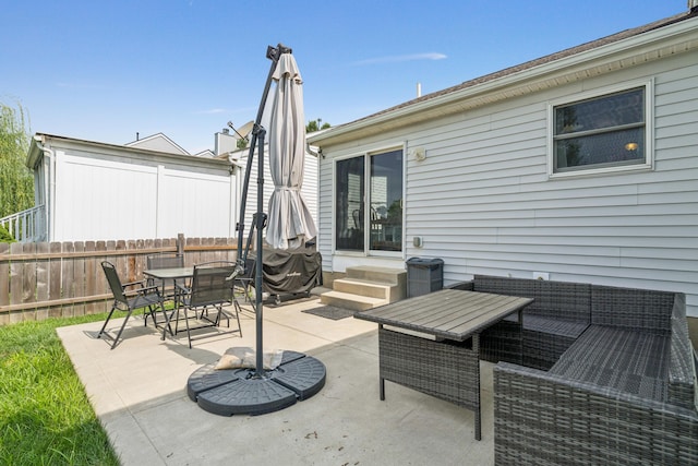 2587 Weeping Willow Ct, Columbus, OH 43207 - view of patio with entry steps, outdoor dining space, and an outdoor hangout area