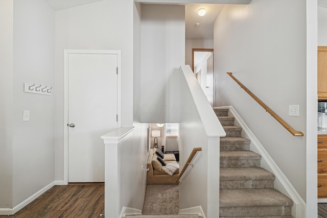 2587 Weeping Willow Ct, Columbus, OH 43207 - stairs featuring wood finished floors and baseboards