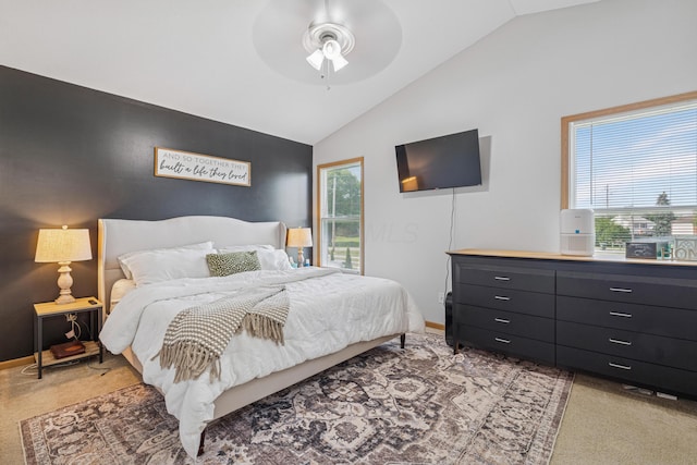 2587 Weeping Willow Ct, Columbus, OH 43207 - bedroom with vaulted ceiling, light carpet, and a ceiling fan