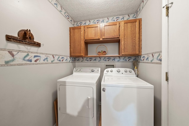 3625 Peany Ln, Canal Winchester, OH 43110 - laundry area with cabinet space and washer and dryer