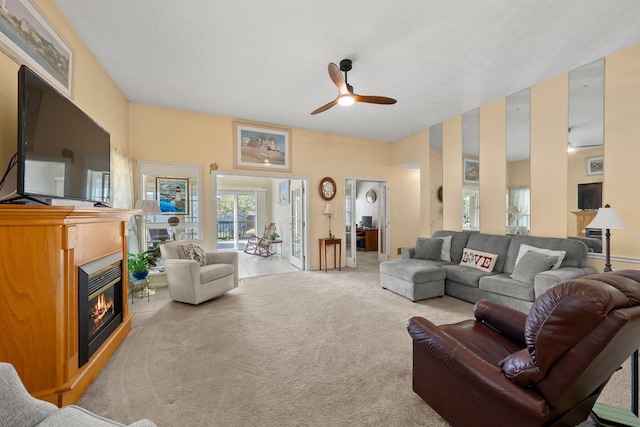 3625 Peany Ln, Canal Winchester, OH 43110 - living area with carpet, a ceiling fan, and a glass covered fireplace