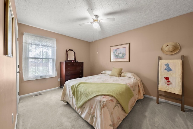 3625 Peany Ln, Canal Winchester, OH 43110 - bedroom featuring light carpet, ceiling fan, and a textured ceiling