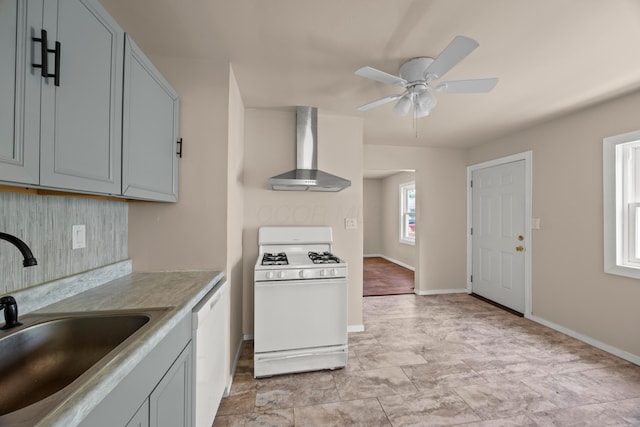 2300 Atwood Ter, Columbus, OH 43211 - kitchen with white appliances, wall chimney range hood, decorative backsplash, a ceiling fan, and light countertops
