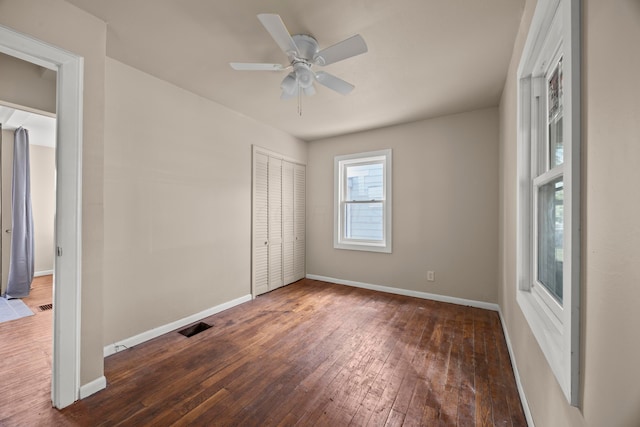 2300 Atwood Ter, Columbus, OH 43211 - unfurnished bedroom featuring wood-type flooring, a closet, and ceiling fan