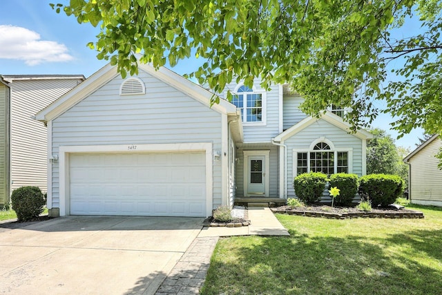 5497 Mirage Dr, Hilliard, OH 43026 - traditional-style house with driveway, a garage, and a front lawn