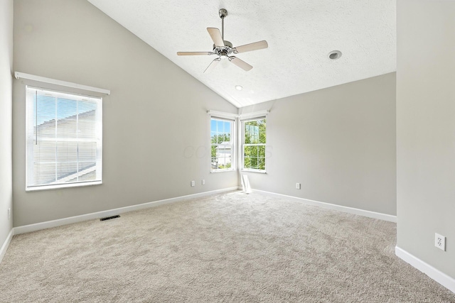 5497 Mirage Dr, Hilliard, OH 43026 - unfurnished room with carpet floors, ceiling fan, a textured ceiling, and high vaulted ceiling