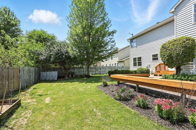 5497 Mirage Dr, Hilliard, OH 43026 - fenced backyard with a wooden deck