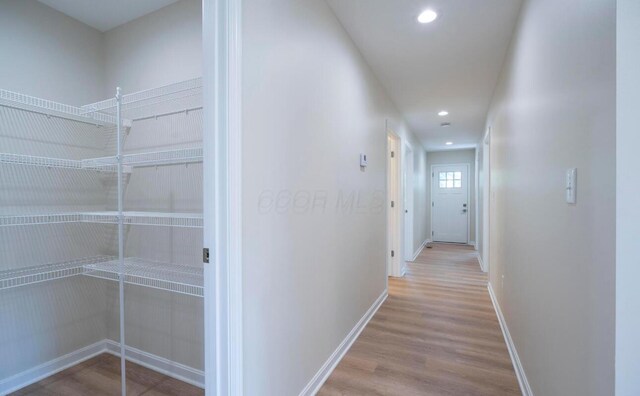 32 Maple St, Jeffersonville, OH 43128 - hall featuring wood finished floors and recessed lighting