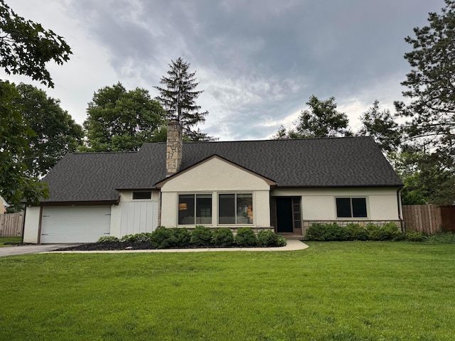 2710 NW Blvd, Columbus, OH 43221 - view of front of property with an attached garage, driveway, a chimney, and roof with shingles