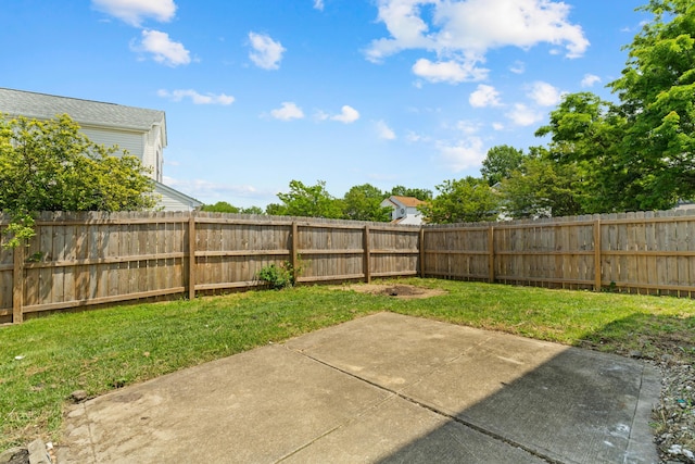4690 Ascot Dr, Columbus, OH 43229 - fenced backyard featuring a patio area