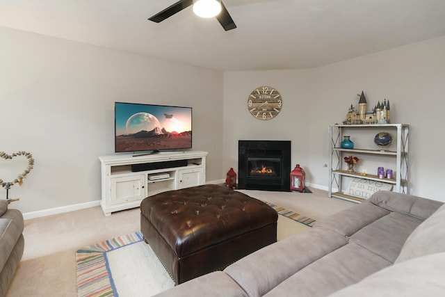 5649 Chippewa Falls St, Dublin, OH 43016 - living area with light carpet, a ceiling fan, and a fireplace with flush hearth