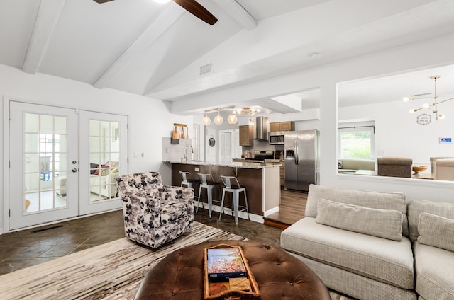 230 Barcelona Ave, Westerville, OH 43081 - living room with a chandelier and french doors