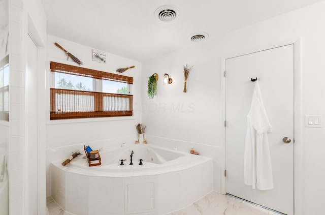 230 Barcelona Ave, Westerville, OH 43081 - bathroom with marble look tiles and a whirlpool tub