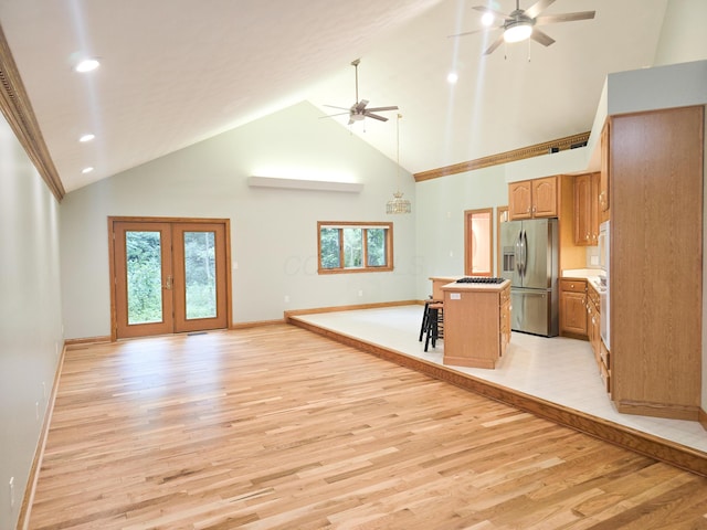 3100 Kropp Rd, Grove City, OH 43123 - kitchen featuring stainless steel refrigerator with ice dispenser, ceiling fan, high vaulted ceiling, light wood-style floors, and open floor plan