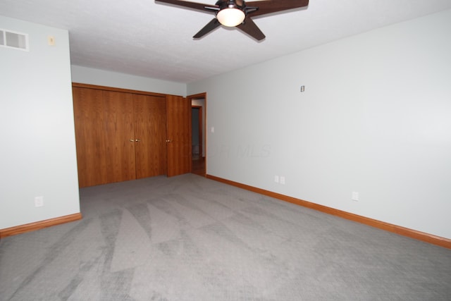 3100 Kropp Rd, Grove City, OH 43123 - unfurnished bedroom with light carpet, a closet, and ceiling fan