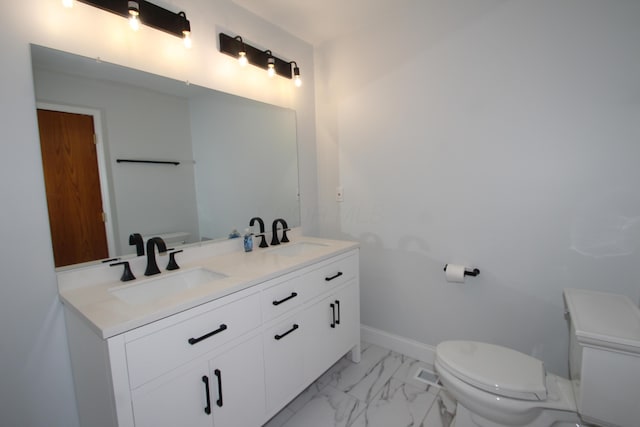 3100 Kropp Rd, Grove City, OH 43123 - bathroom featuring double vanity and marble finish flooring
