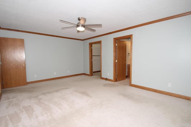 3100 Kropp Rd, Grove City, OH 43123 - unfurnished bedroom featuring carpet, ornamental molding, a walk in closet, a ceiling fan, and a closet