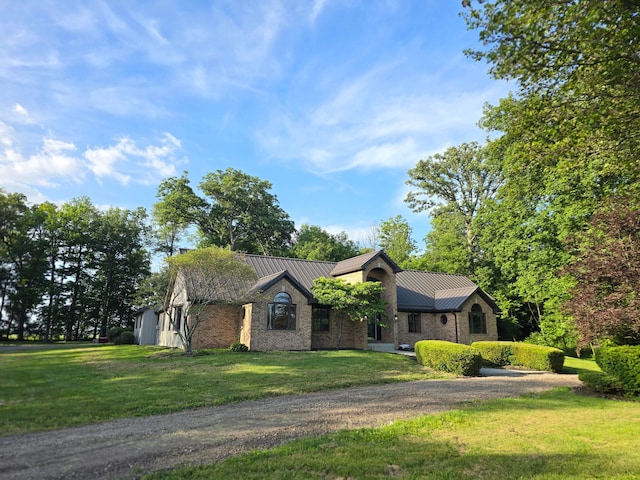 3100 Kropp Rd, Grove City, OH 43123 - view of front of home featuring a metal roof, a standing seam roof, and a front yard