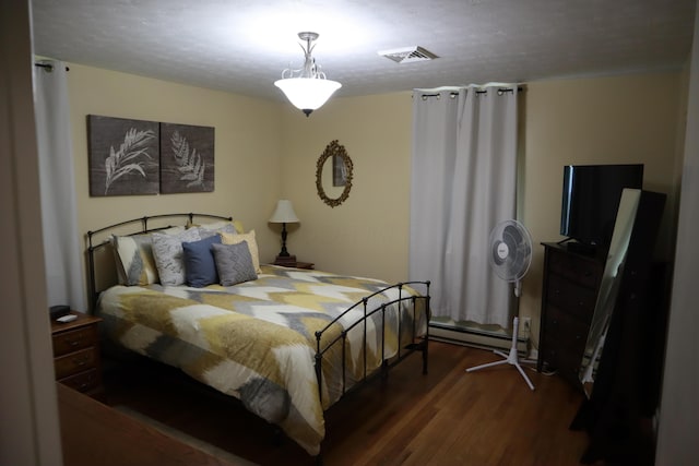 4224 Tschopp Rd NE, Lancaster, OH 43130 - bedroom with wood finished floors and baseboard heating