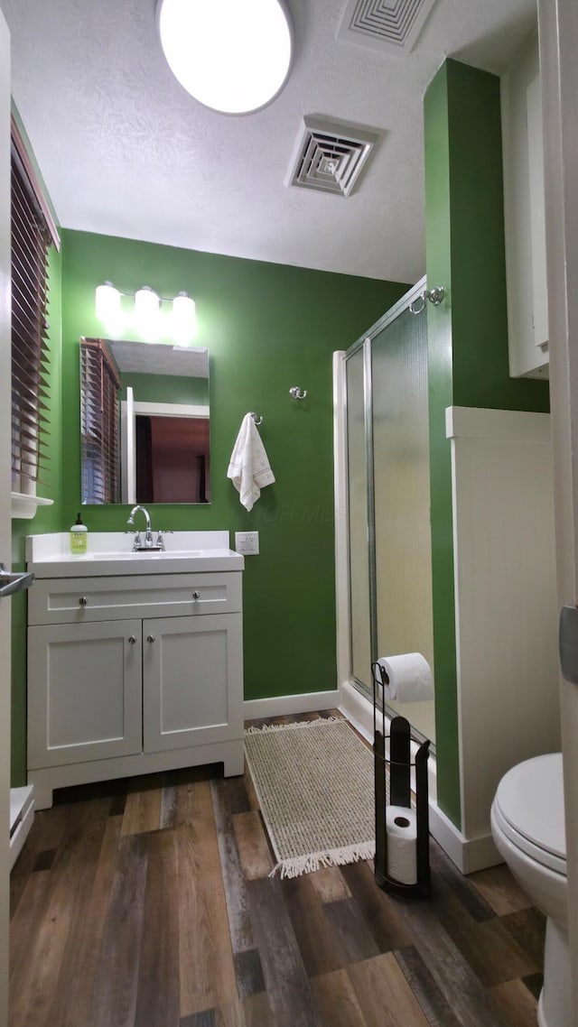 4224 Tschopp Rd NE, Lancaster, OH 43130 - bathroom featuring a shower stall, vanity, and wood finished floors