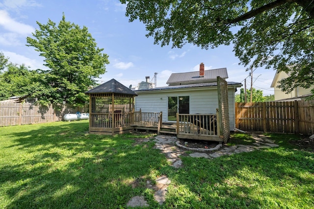 3053 E Old Duvall Ct, Lockbourne, OH 43137 - back of property featuring a gazebo, a fenced backyard, a wooden deck, and a metal roof