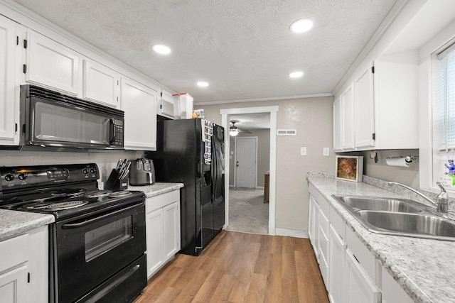 3053 E Old Duvall Ct, Lockbourne, OH 43137 - kitchen featuring black appliances, a ceiling fan, light wood-type flooring, white cabinetry, and recessed lighting