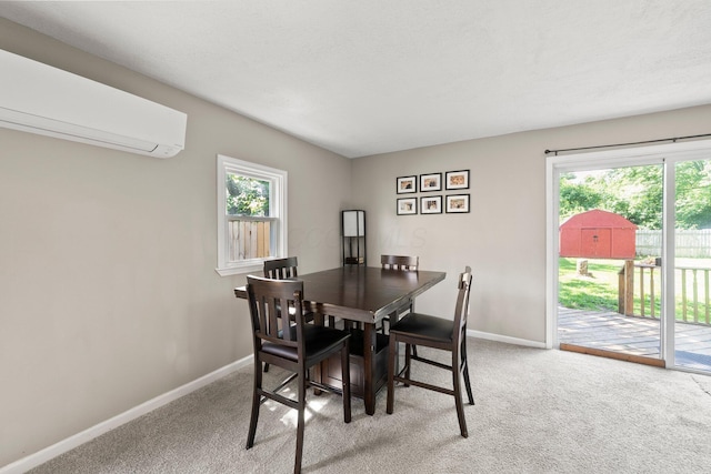 3053 E Old Duvall Ct, Lockbourne, OH 43137 - dining room featuring healthy amount of natural light, carpet floors, and a wall mounted AC
