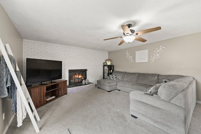 3053 E Old Duvall Ct, Lockbourne, OH 43137 - carpeted living area with ceiling fan and a brick fireplace
