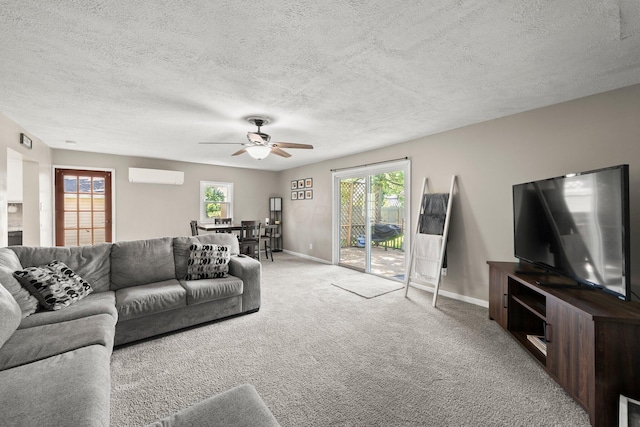 3053 E Old Duvall Ct, Lockbourne, OH 43137 - living area with a wall mounted air conditioner, carpet floors, a ceiling fan, a textured ceiling, and plenty of natural light