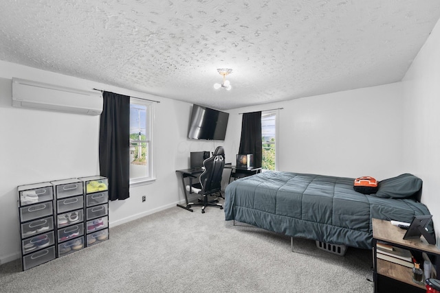3053 E Old Duvall Ct, Lockbourne, OH 43137 - carpeted bedroom featuring a wall mounted air conditioner, a textured ceiling, and an office area