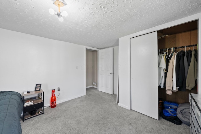 3053 E Old Duvall Ct, Lockbourne, OH 43137 - carpeted bedroom with a closet and a textured ceiling