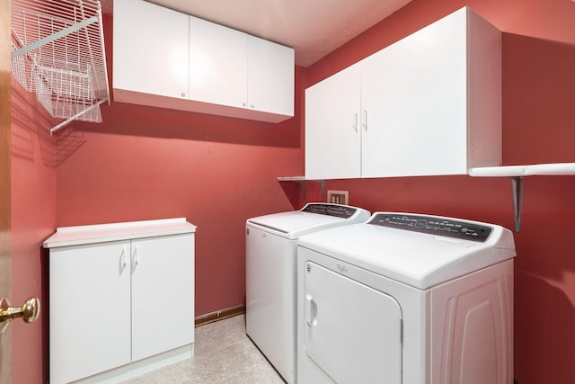 217 Knight Dream St, Delaware, OH 43015 - laundry area with cabinet space and washer and clothes dryer
