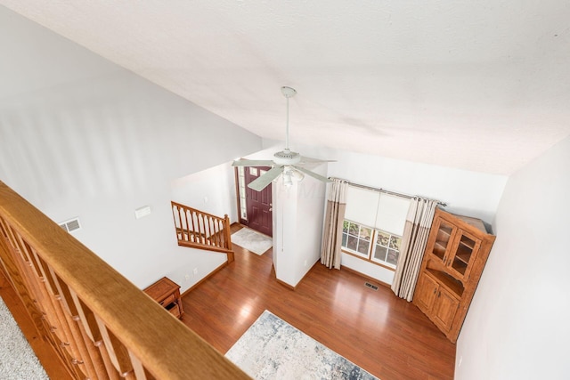 217 Knight Dream St, Delaware, OH 43015 - stairs featuring lofted ceiling, ceiling fan, and wood finished floors