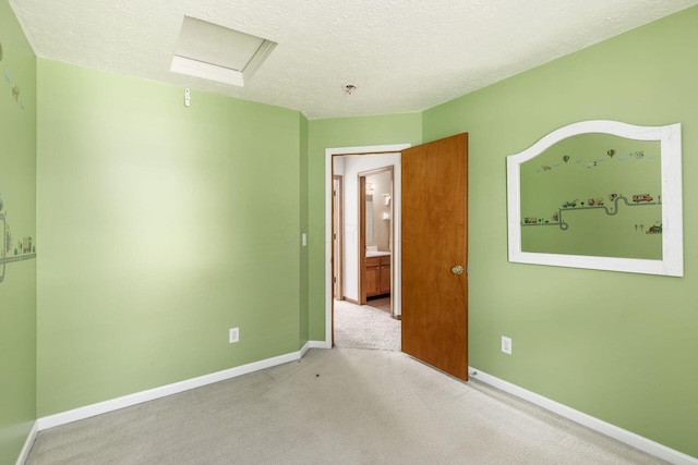 217 Knight Dream St, Delaware, OH 43015 - carpeted spare room with attic access and a textured ceiling
