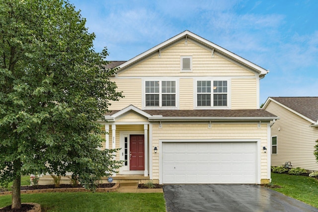 978 Vanwert Loop, Blacklick, OH 43004 - traditional-style house with driveway, a garage, a front yard, and roof with shingles