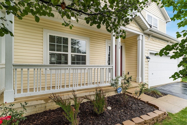 978 Vanwert Loop, Blacklick, OH 43004 - view of front of property featuring covered porch, a garage, and driveway