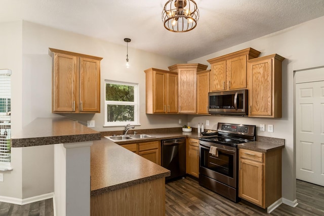 978 Vanwert Loop, Blacklick, OH 43004 - kitchen with appliances with stainless steel finishes, dark countertops, and dark wood finished floors