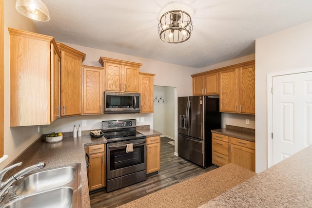 978 Vanwert Loop, Blacklick, OH 43004 - kitchen with stainless steel appliances and dark wood finished floors