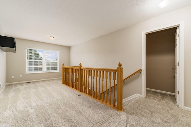 978 Vanwert Loop, Blacklick, OH 43004 - hall with an upstairs landing and carpet flooring